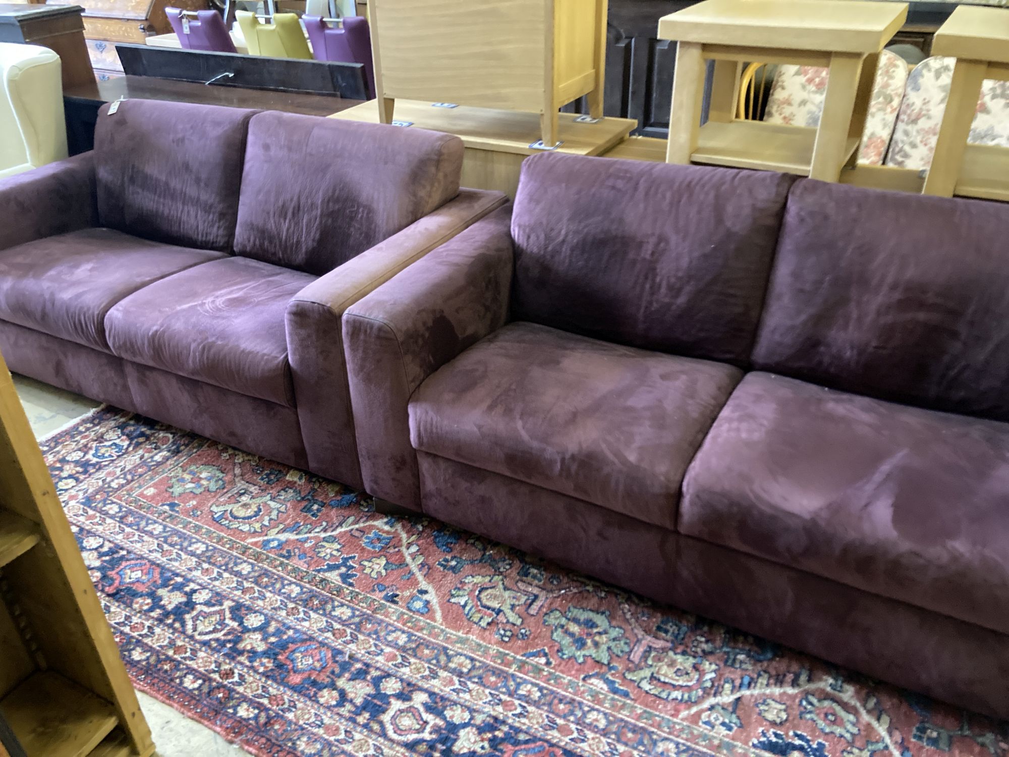 A pair of modern two-seater settees covered in suede, length 170cm, depth 94cm, height 80cm
